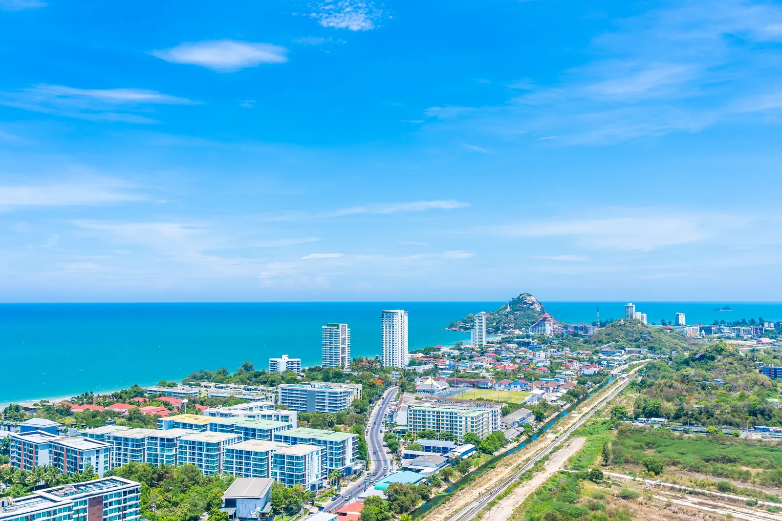 Hua Hin beach, pier and coastline at golden hour